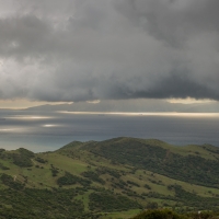 Africa on the horizon, beneath the clouds