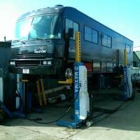 Our RV up on our column lifts...