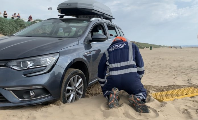 Car stuck in Sand July 19.png